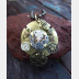 Mixed metal steampunk watchwork gear pendant