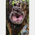 Bold and sassy rhodonite mixed metal donut pendant