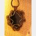 Copper black onyx tree of life with a swirling spirals wire woven pendant one of