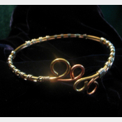 Upper Arm cuff  bracelet of copper, brass, and silver wire.