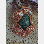 Copper and silver wire woven turquoise pendantCopper and silver wire woven turqu