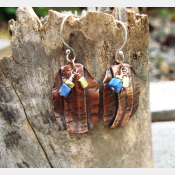 Primitive fold form tribal dangle earrings with bead accents