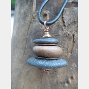 Beach stone stacked rock with copper Om rock cairn zen pendant