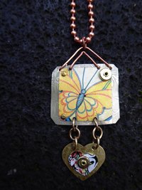Trashy tin butterfly mixed metal love pendant