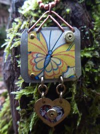 Trashy tin butterfly mixed metal love pendant