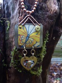 Trashy tin butterfly mixed metal love pendant