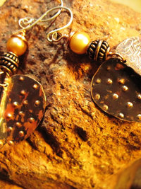 Tribal fold form heart dangle earrings