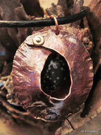 Tribal copper fold form pendant
