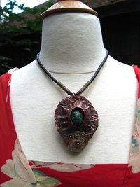 Copper mixed metal large fold form cocoon pendant with turquoise