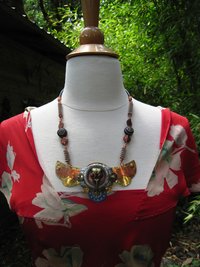 Steampunk statement repurposed breastplate winged watch parts