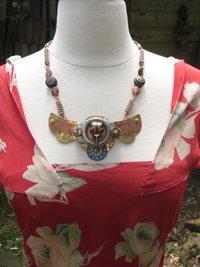 Steampunk statement repurposed breastplate winged watch parts