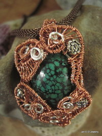 Copper and silver wire woven turquoise pendant