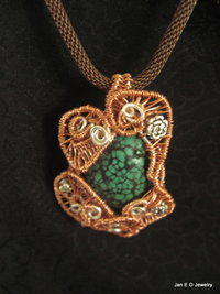 Copper and silver wire woven turquoise pendant