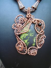 Green and Black Epidote Cabochon copper wire weave pendant with onyx and viking