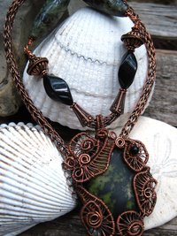 Green and Black Epidote Cabochon copper wire weave pendant with onyx and viking