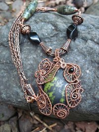 Green and Black Epidote Cabochon copper wire weave pendant with onyx and viking