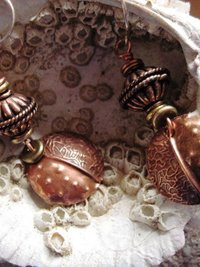 Copper fold form tribal dangle earring