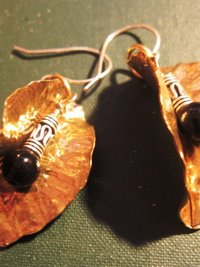 Tribal fold form bronze leaf earrings with sterling and black onyx