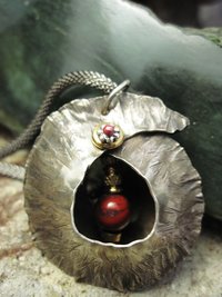 Fold form jasper gemstone and German silver cocoon pendant