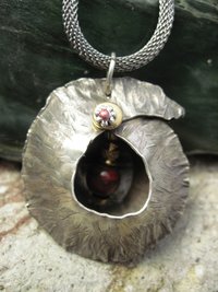 Fold form jasper gemstone and German silver cocoon pendant