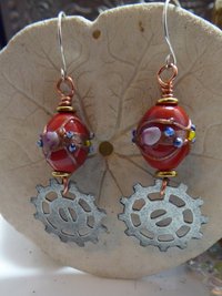 Geared up steampunk orange lampwork dangle earrings