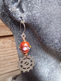 Geared up steampunk orange lampwork dangle earrings