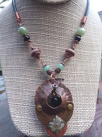 Copper forged fold form mixed metal cocoon pendant with beads