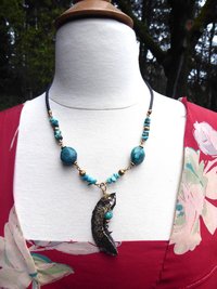 Organic, tribal fold form turquoise gemstone bronze crescent moon pendant with t