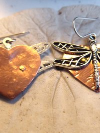 Mixed metal dangle dragonfly earrings with a copper heart