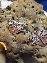 Mixed metal dangle dragonfly earrings with a copper heart