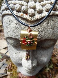 Tibetan inspired prayer pendant in brass with recycled tin word - Trust