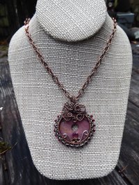 Bold and sassy rhodonite mixed metal donut pendant