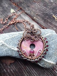 Bold and sassy rhodonite mixed metal donut pendant