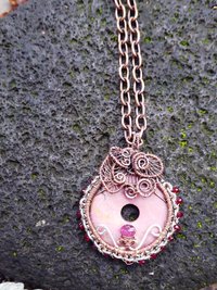 Bold and sassy rhodonite mixed metal donut pendant