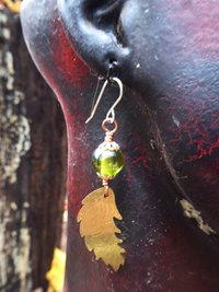 Bead and feather brass dangle earrings