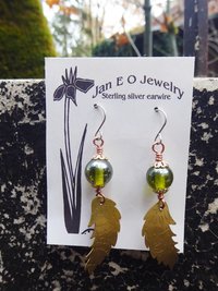 Bead and feather brass dangle earrings