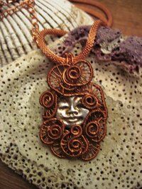 Silver and Copper Handmade Moon Face Pendant