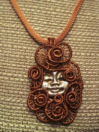 Silver and Copper Handmade Moon Face Pendant