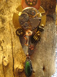 Steampunk mixed metal watchwork gear pendant called Full Steam Ahead