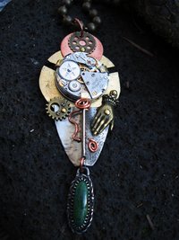 Steampunk mixed metal watchwork gear pendant called Full Steam Ahead