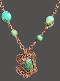 Copper and silver wire woven turquoise pendant with turquoise and copper chain