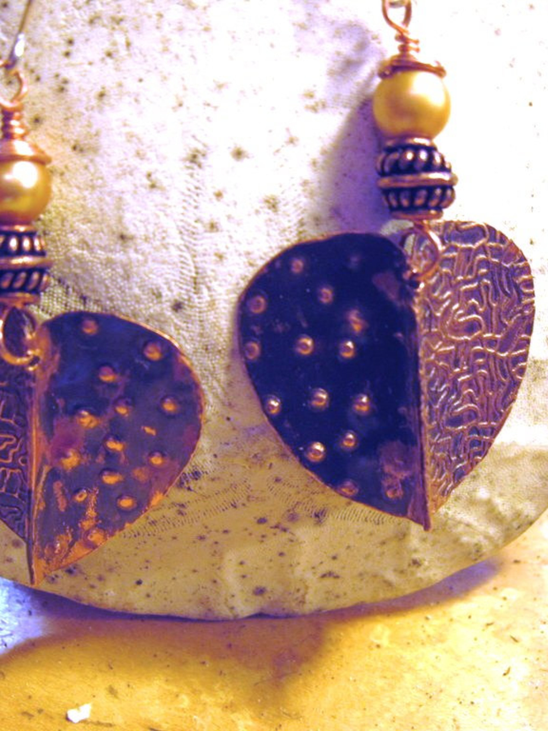 Tribal fold form heart dangle earrings
