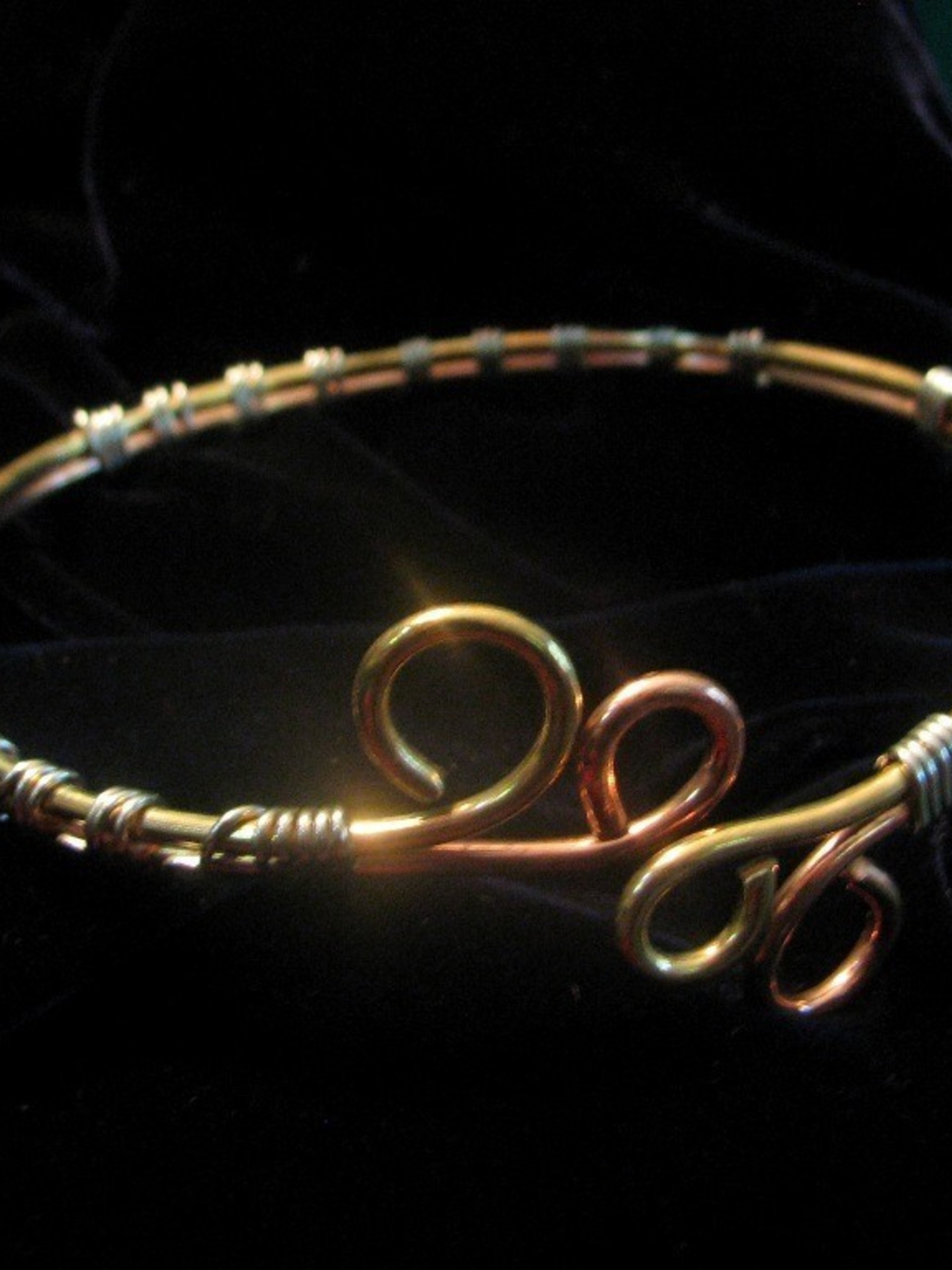 Upper Arm cuff  bracelet of copper, brass, and silver wire.