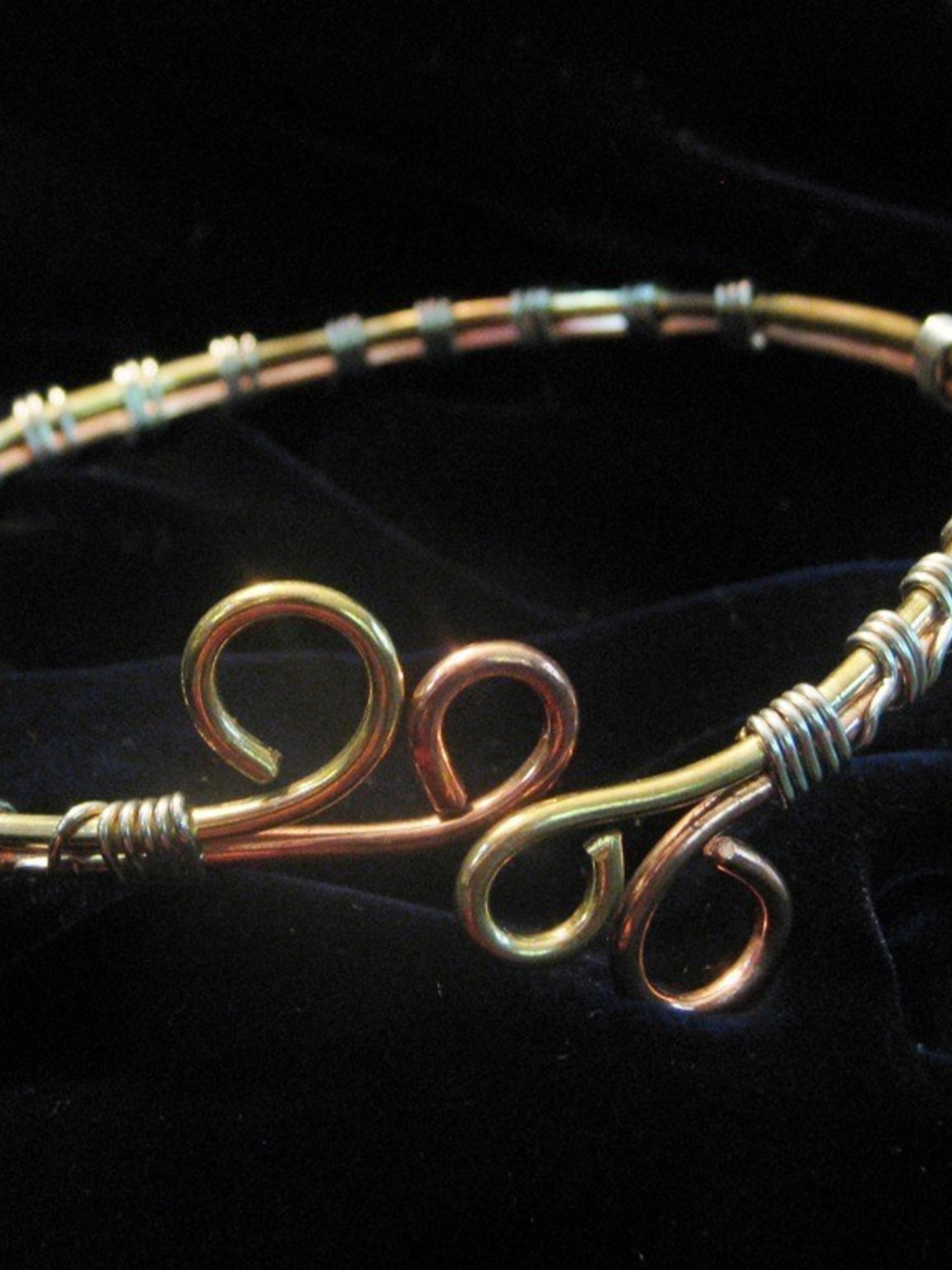 Upper Arm cuff  bracelet of copper, brass, and silver wire.