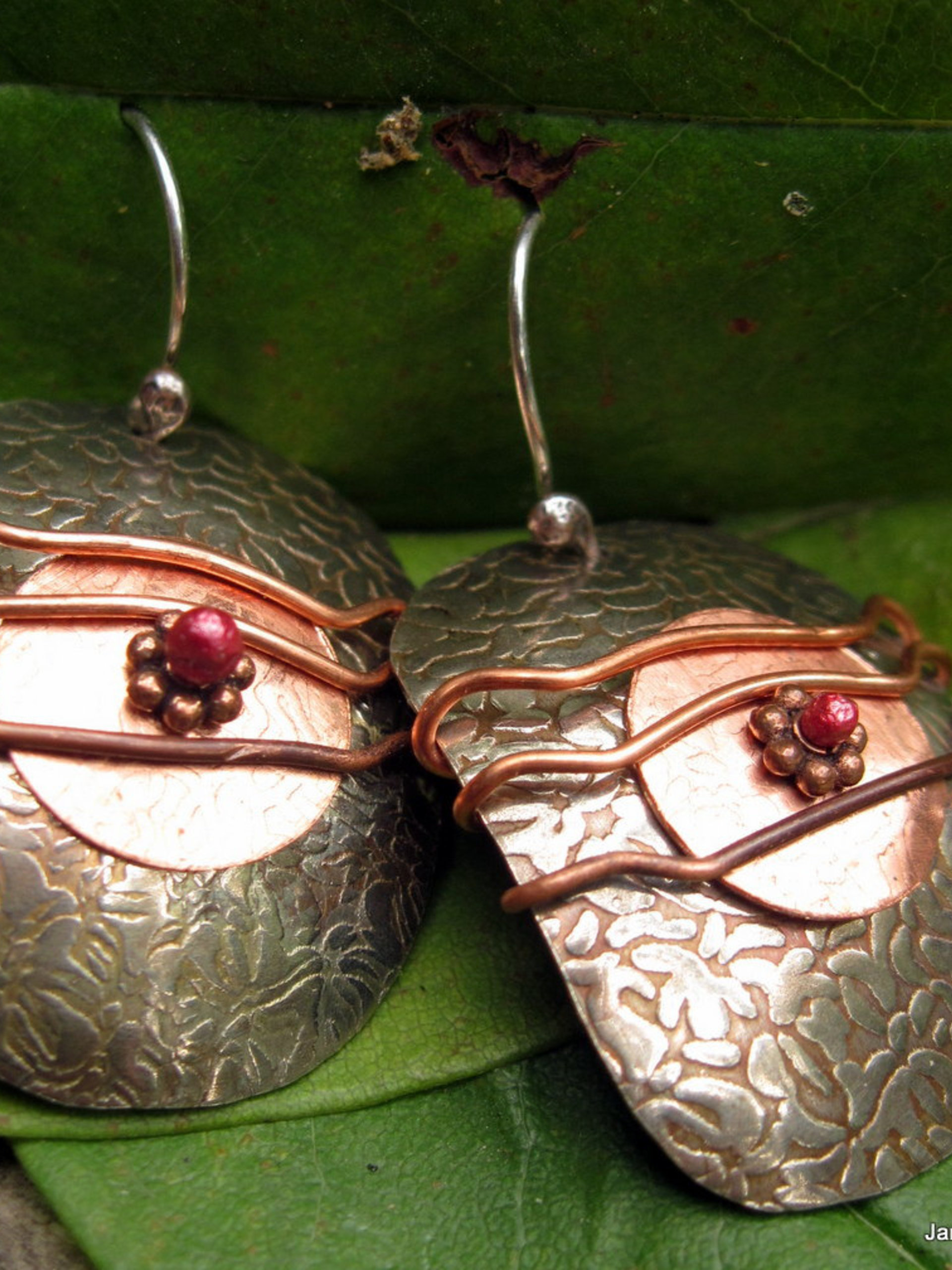 Etched silver and copper earrings