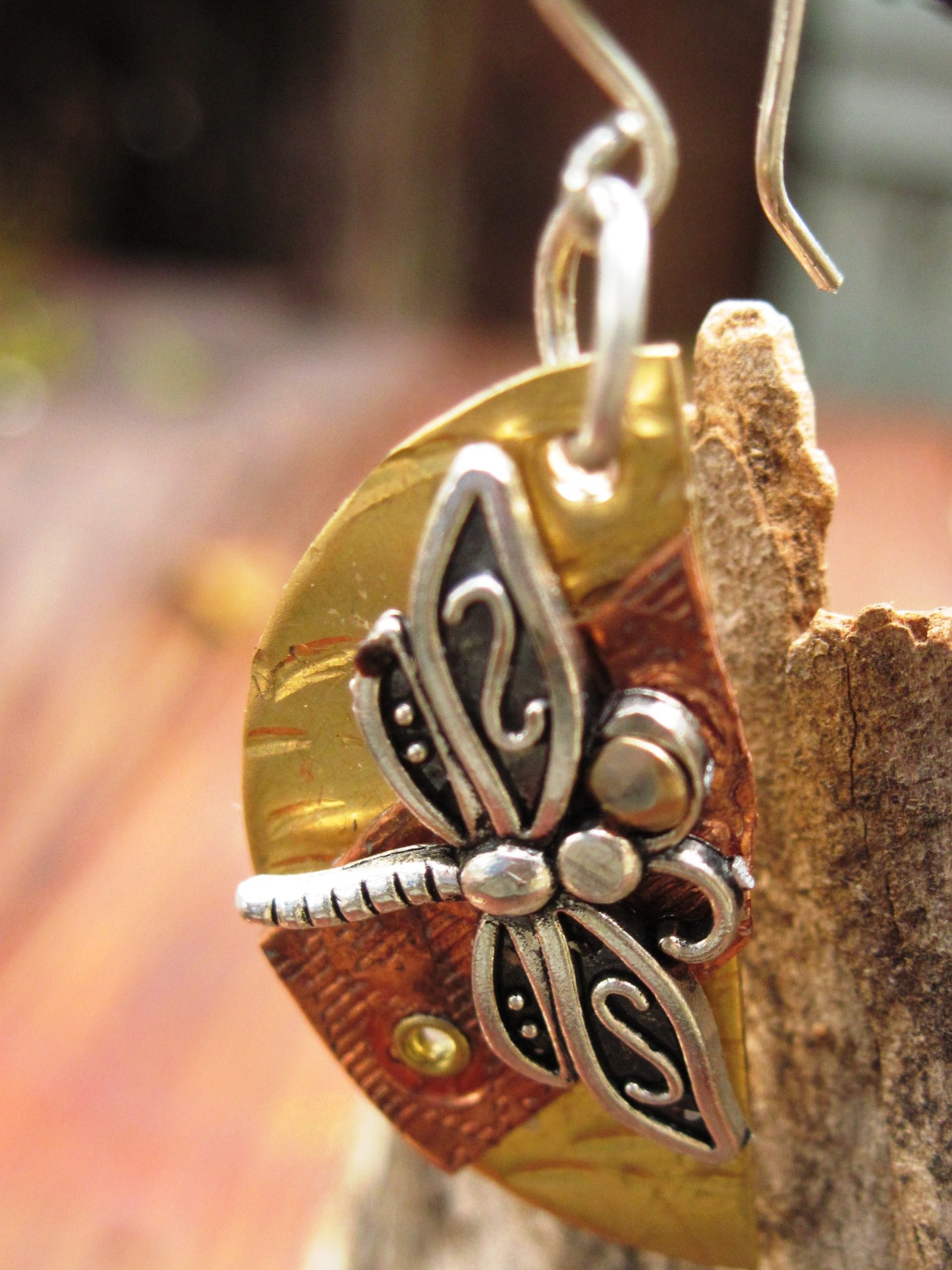 Mixed metal dragonfly half moon dangle earrings