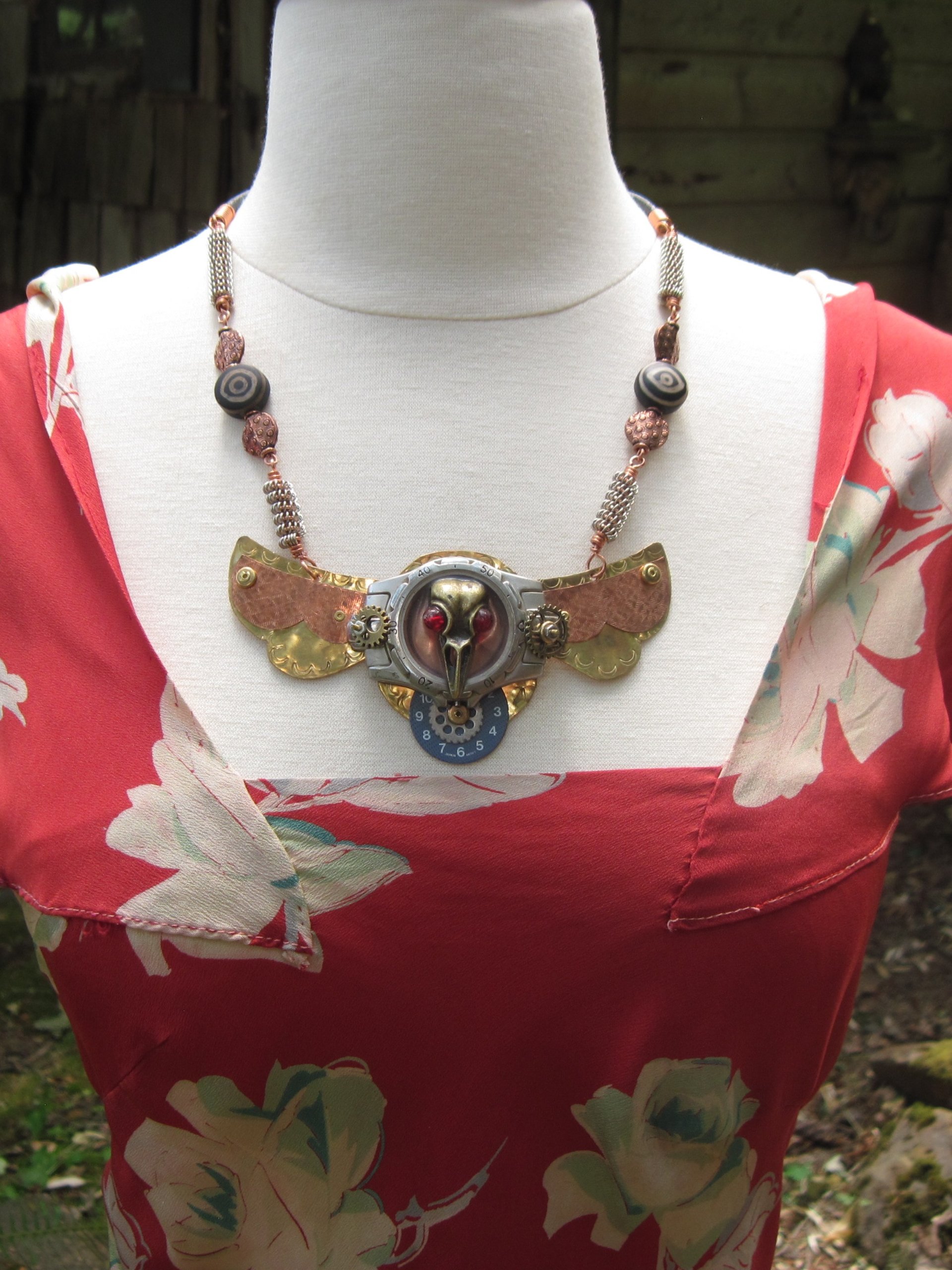 Steampunk statement repurposed breastplate winged watch parts
