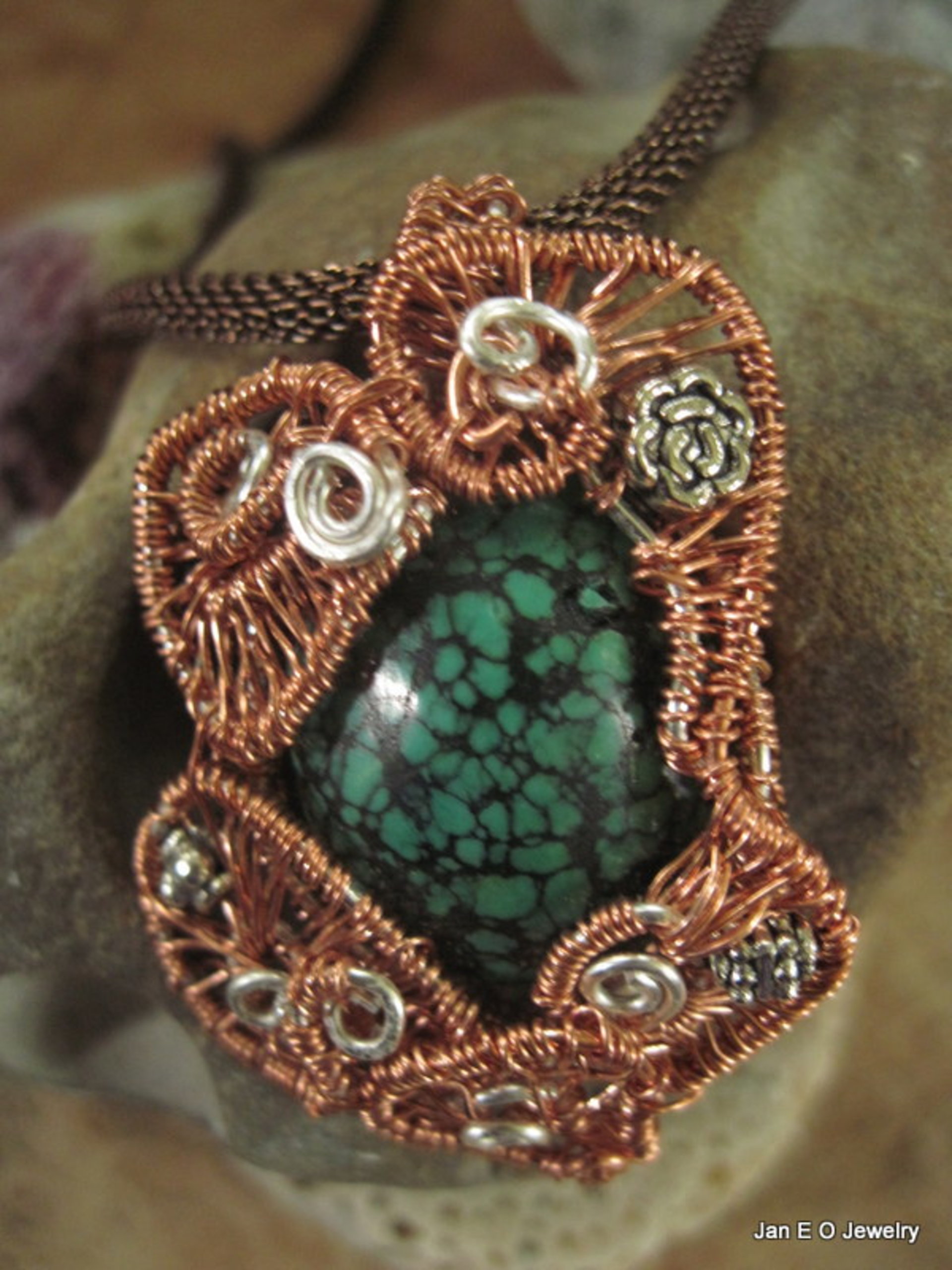 Copper and silver wire woven turquoise pendant