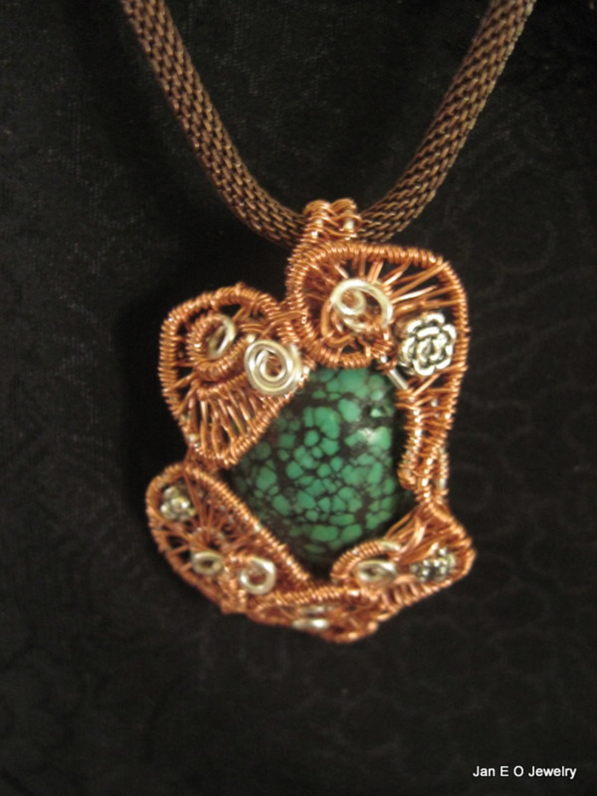 Copper and silver wire woven turquoise pendant