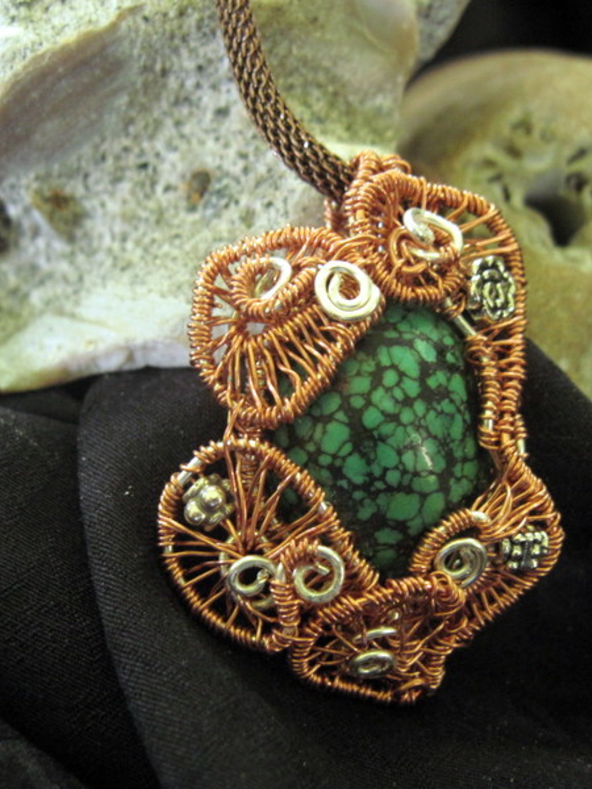 Copper and silver wire woven turquoise pendant